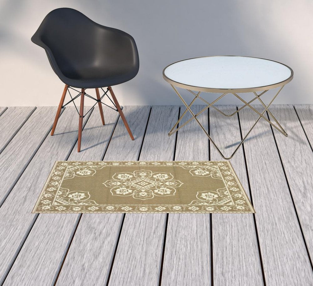 2' X 4' Gray and Ivory Oriental Stain Resistant Indoor Outdoor Area Rug