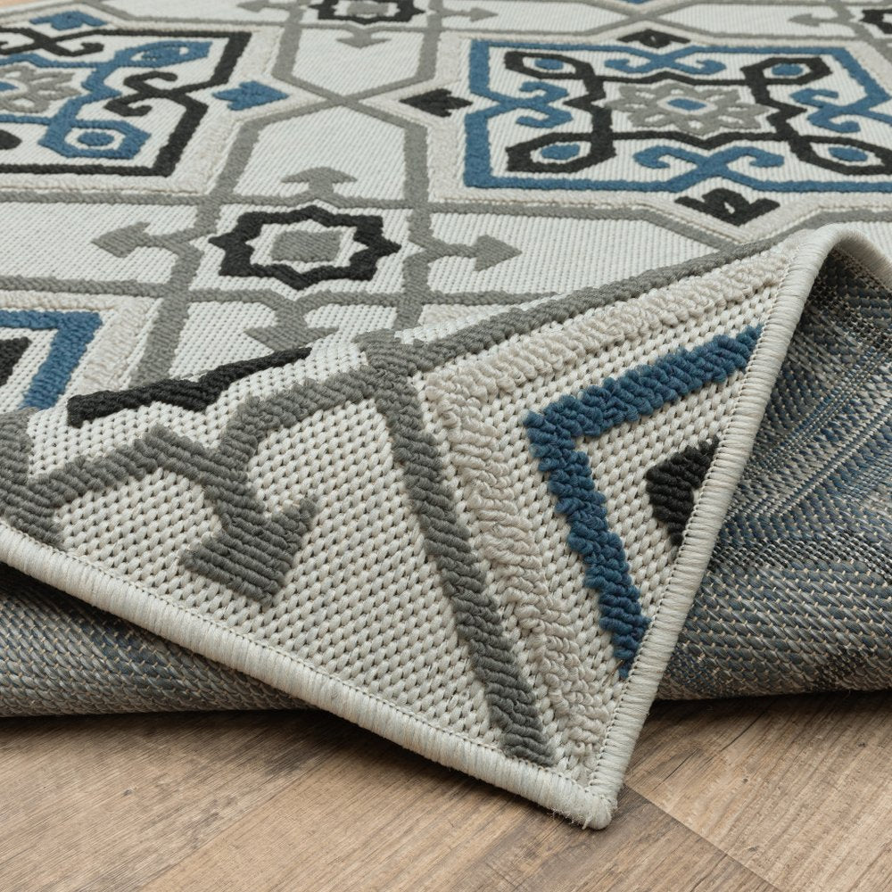 2' X 4' Blue and Beige Oriental Stain Resistant Indoor Outdoor Area Rug