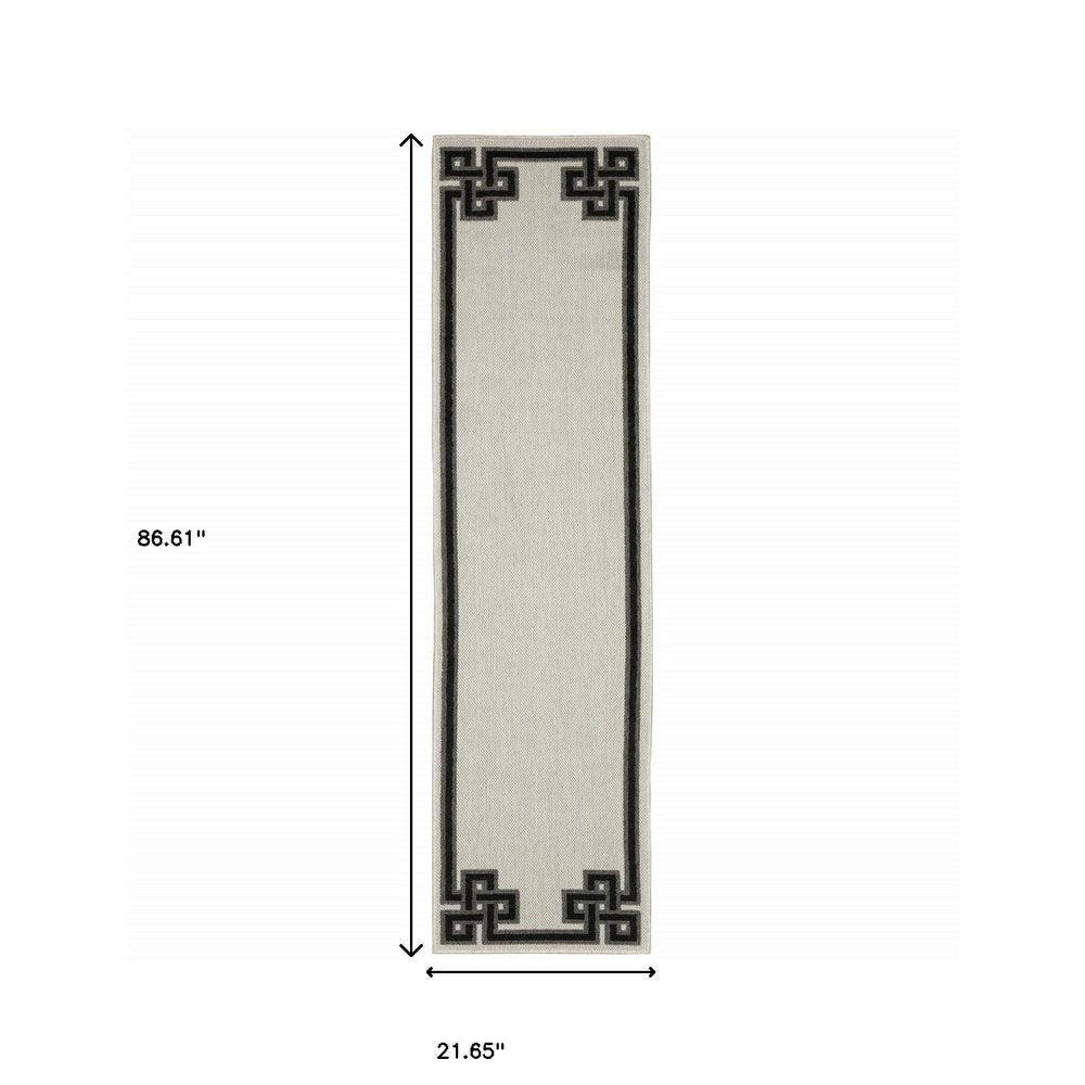 2' X 4' Beige and Black Stain Resistant Indoor Outdoor Area Rug