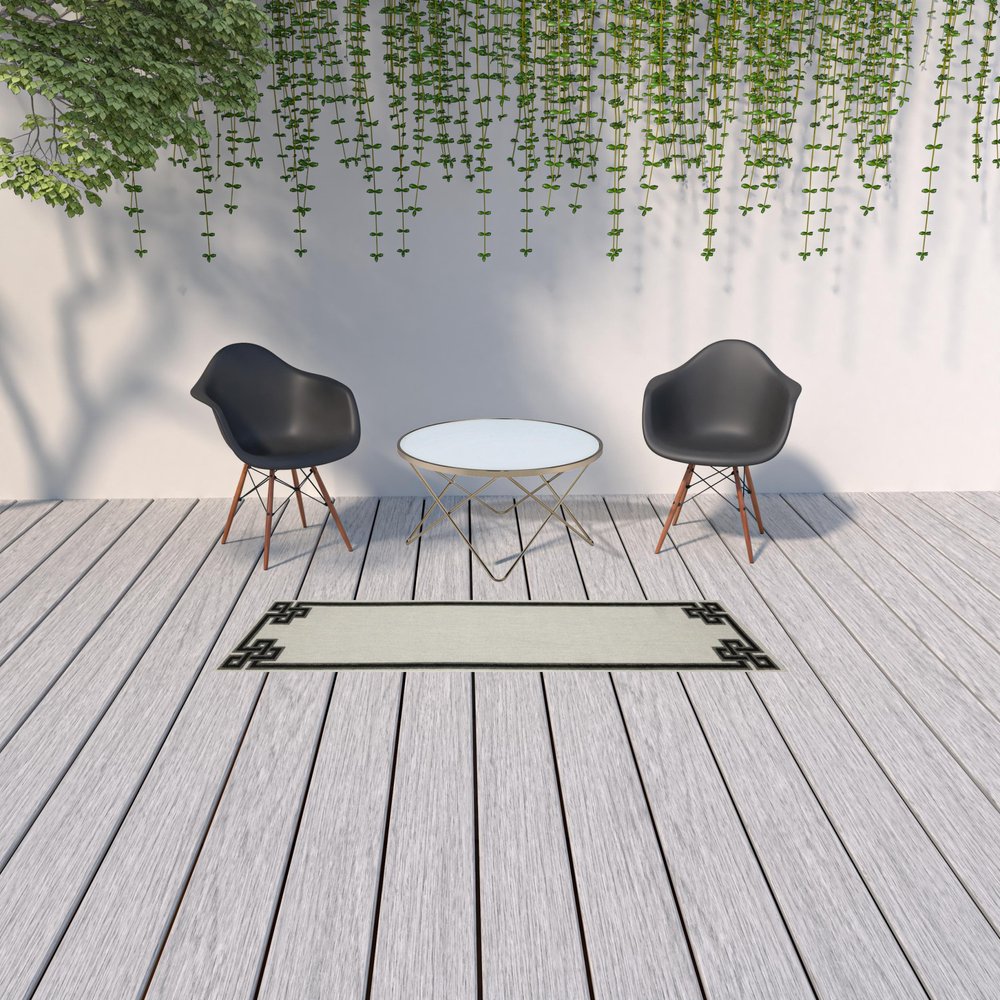 2' X 4' Beige and Black Stain Resistant Indoor Outdoor Area Rug
