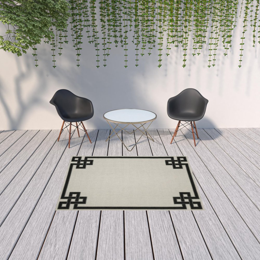 2' X 4' Beige and Black Stain Resistant Indoor Outdoor Area Rug