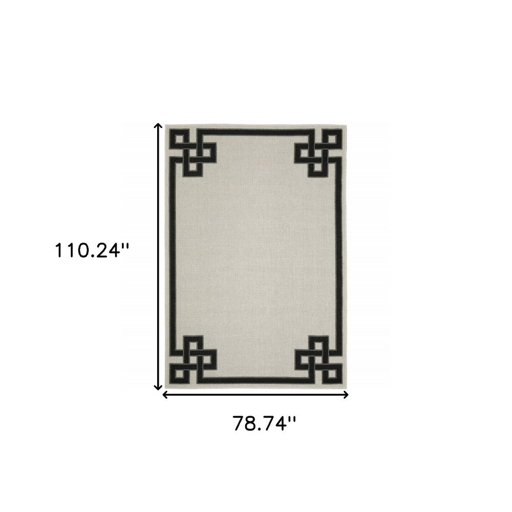 2' X 4' Beige and Black Stain Resistant Indoor Outdoor Area Rug