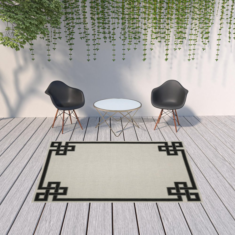 2' X 4' Beige and Black Stain Resistant Indoor Outdoor Area Rug