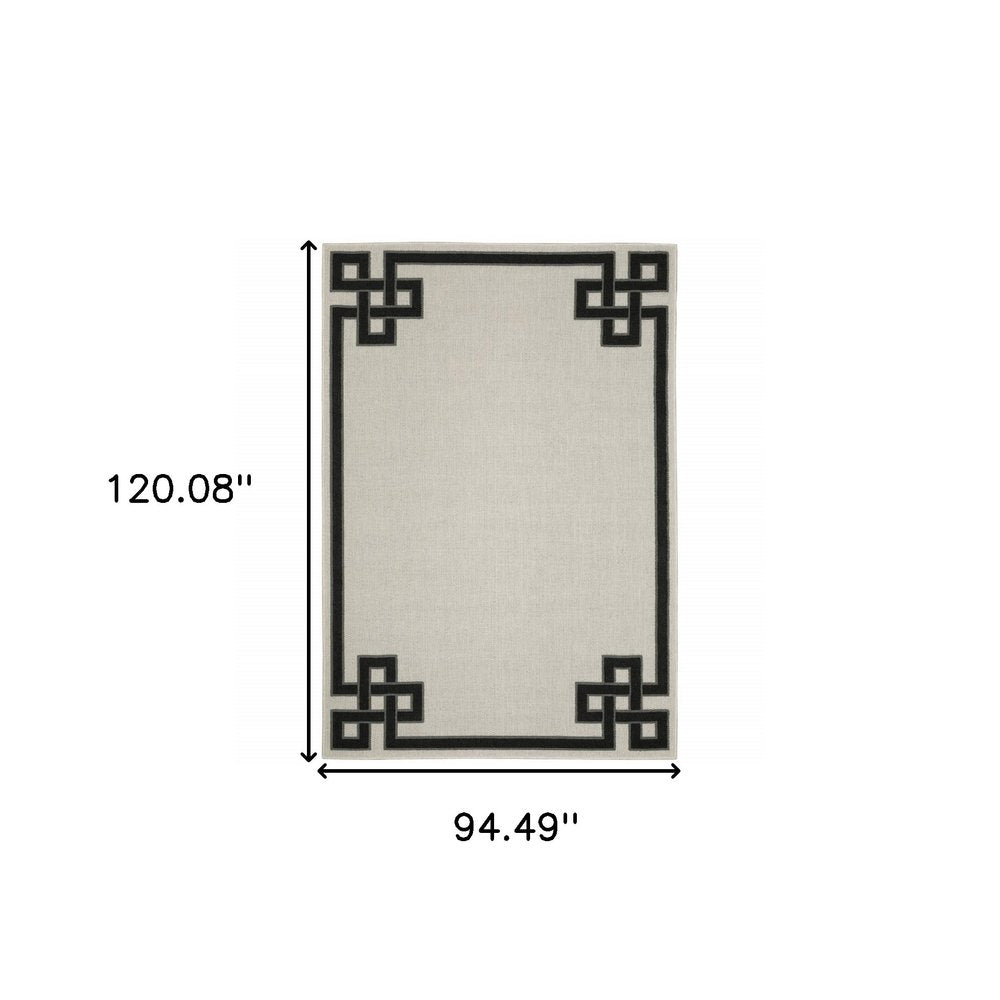 2' X 4' Beige and Black Stain Resistant Indoor Outdoor Area Rug