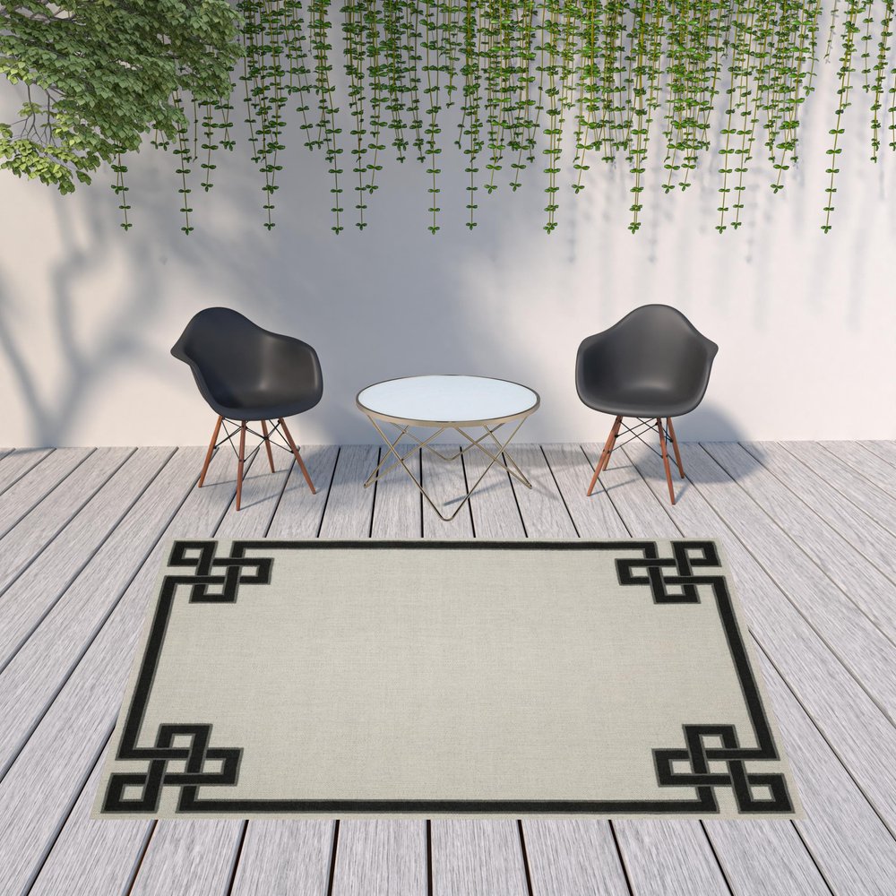 2' X 4' Beige and Black Stain Resistant Indoor Outdoor Area Rug