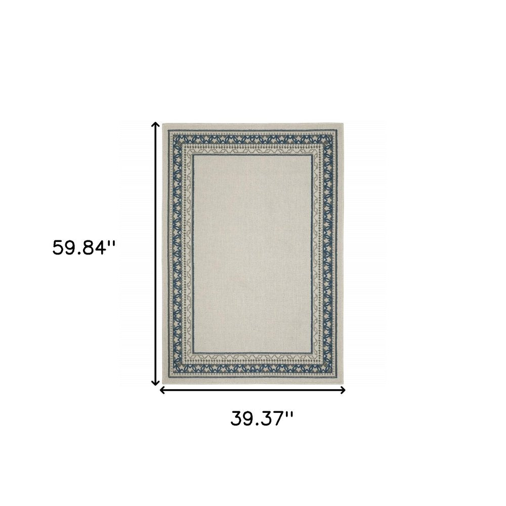 2' X 4' Blue and Beige Stain Resistant Indoor Outdoor Area Rug