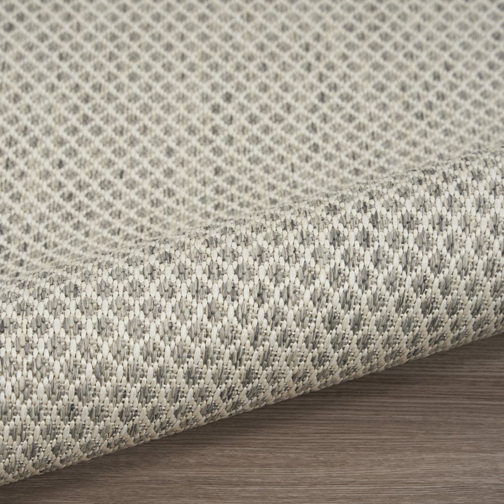 7' X 10' Ivory And Silver Indoor Outdoor Area Rug