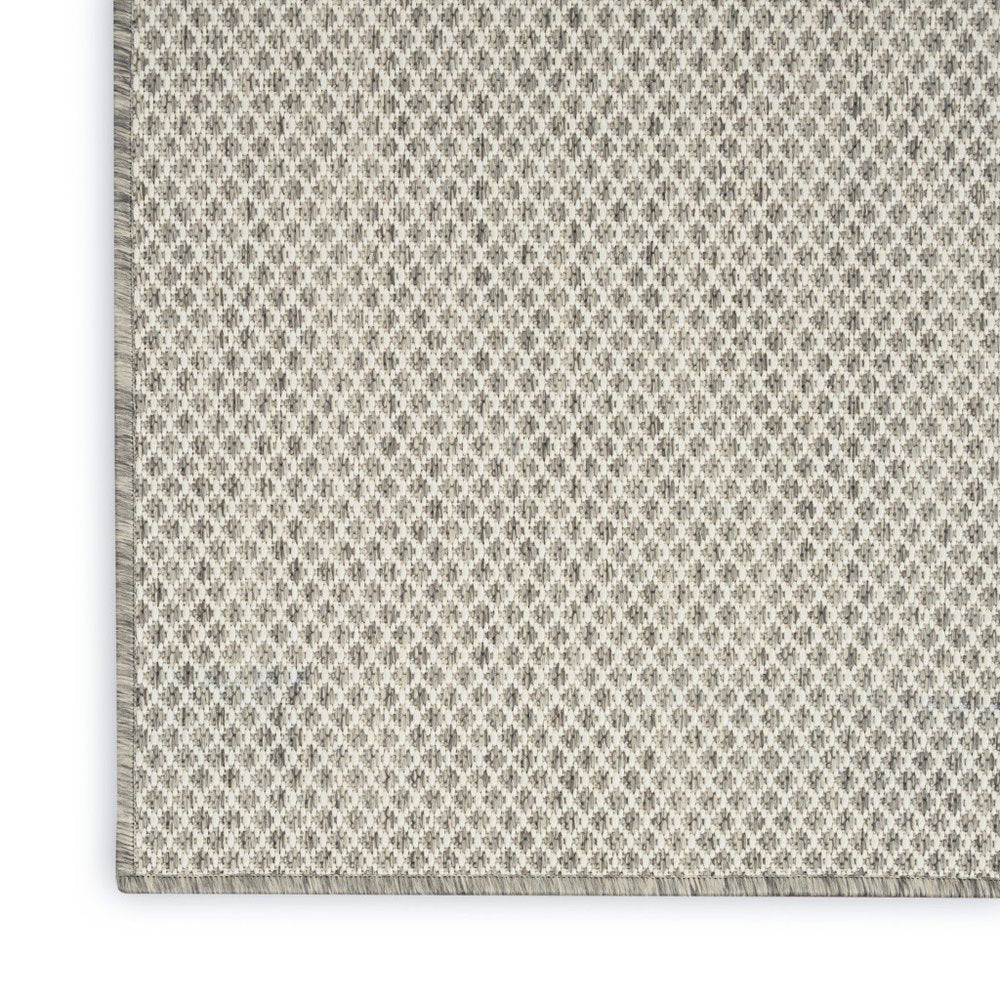7' X 10' Ivory And Silver Indoor Outdoor Area Rug