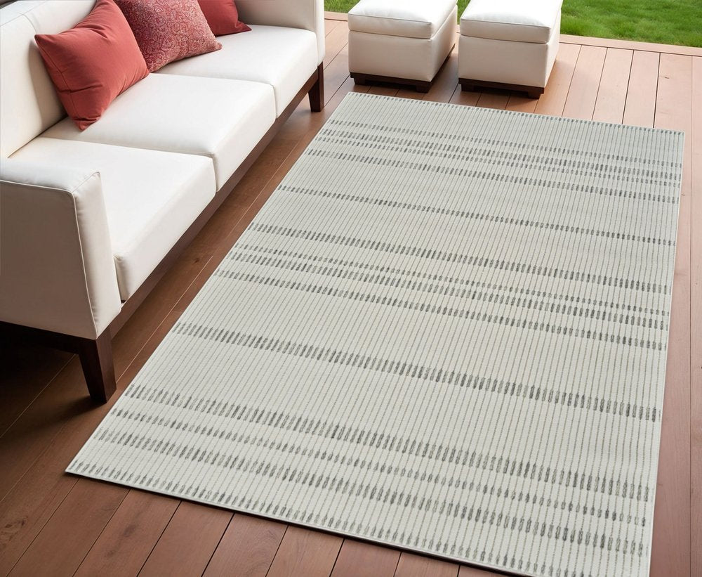 3' X 5' Cream and Beige Striped Distressed Indoor Outdoor Area Rug