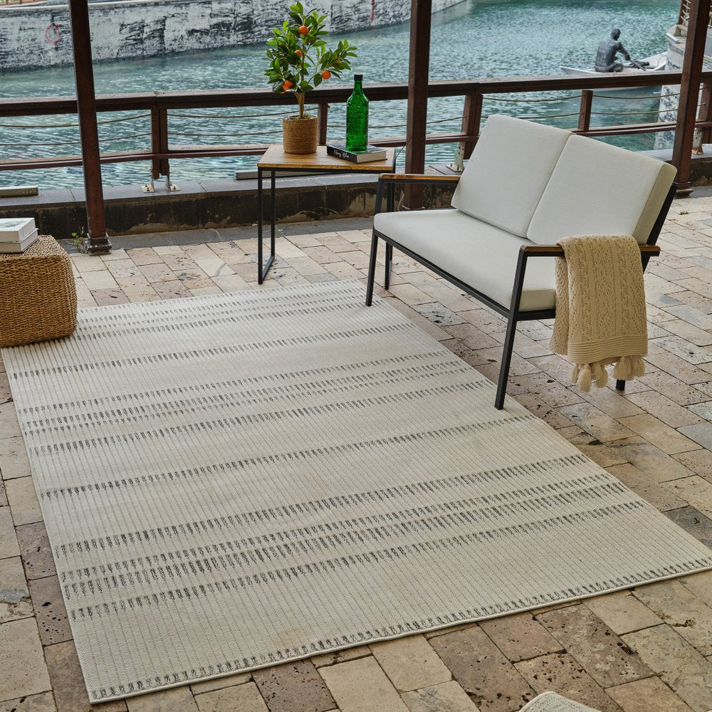 3' X 5' Cream and Beige Striped Distressed Indoor Outdoor Area Rug