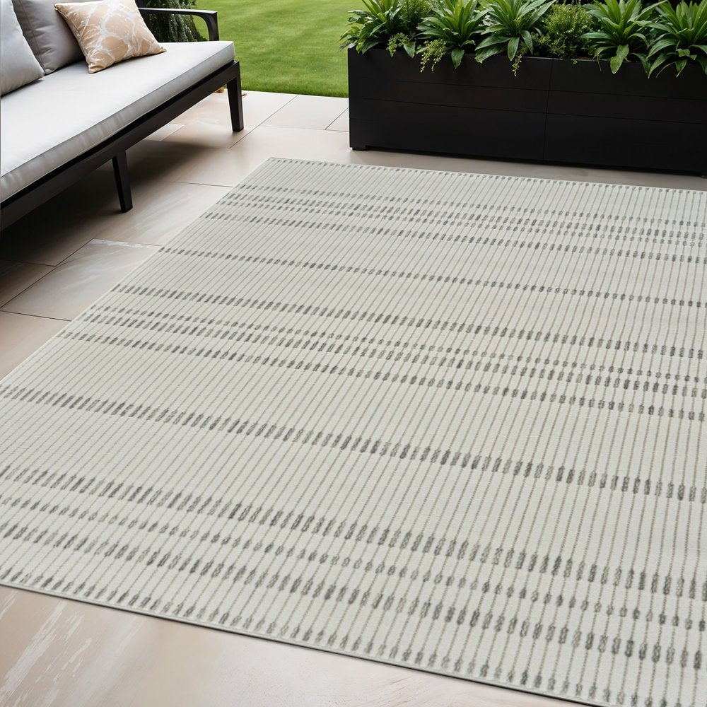 3' X 5' Cream and Beige Striped Distressed Indoor Outdoor Area Rug