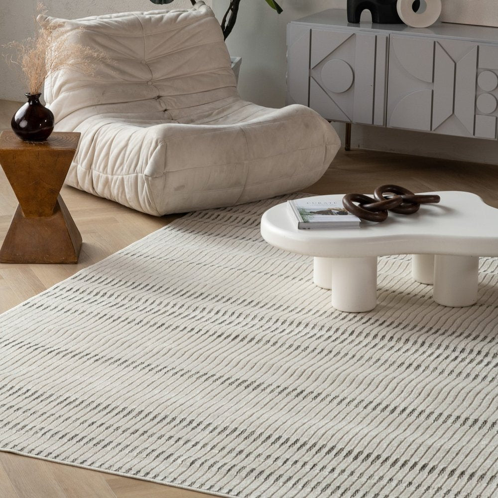 3' X 5' Cream and Beige Striped Distressed Indoor Outdoor Area Rug