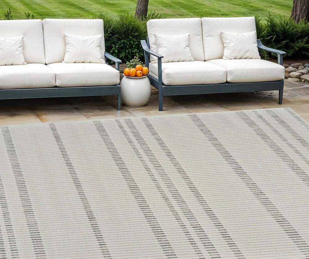 3' X 5' Cream and Beige Striped Distressed Indoor Outdoor Area Rug