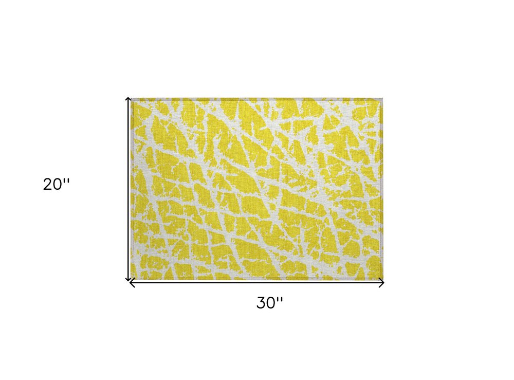 2' X 3' Yellow and White Abstract Washable Non Skid Indoor Outdoor Area Rug