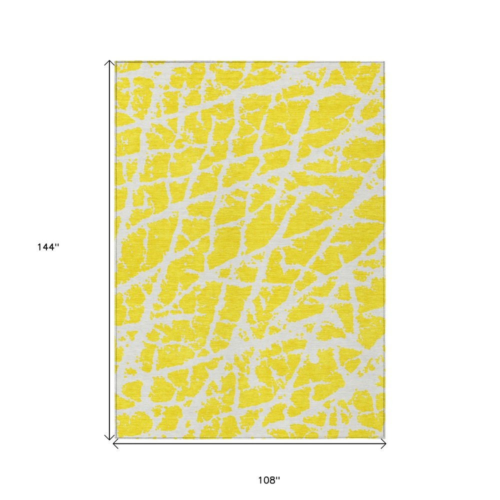 2' X 3' Yellow and White Abstract Washable Non Skid Indoor Outdoor Area Rug