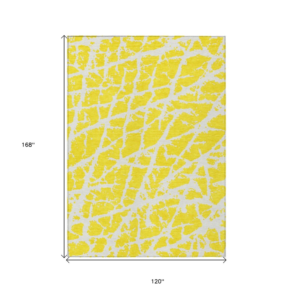 2' X 3' Yellow and White Abstract Washable Non Skid Indoor Outdoor Area Rug