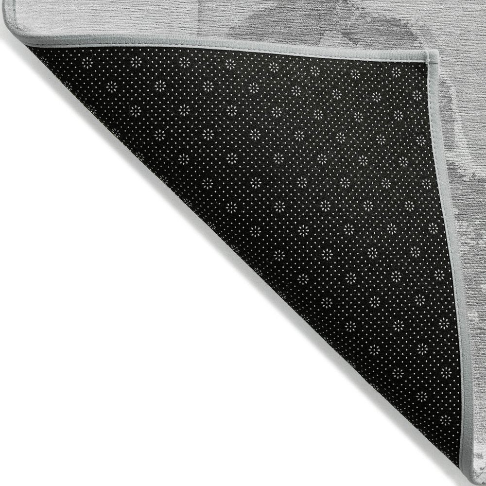 5' X 8' Gray and Ivory Abstract Washable Non Skid Indoor Outdoor Area Rug