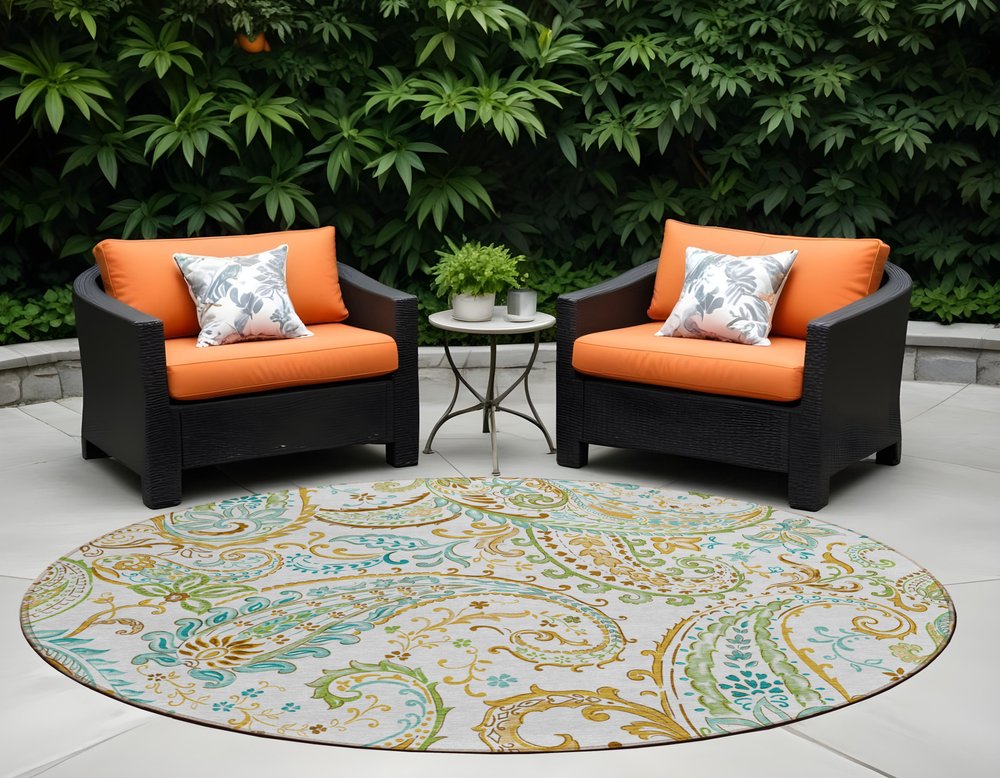 5' X 8' Ivory and Gold Paisley Washable Non Skid Indoor Outdoor Area Rug