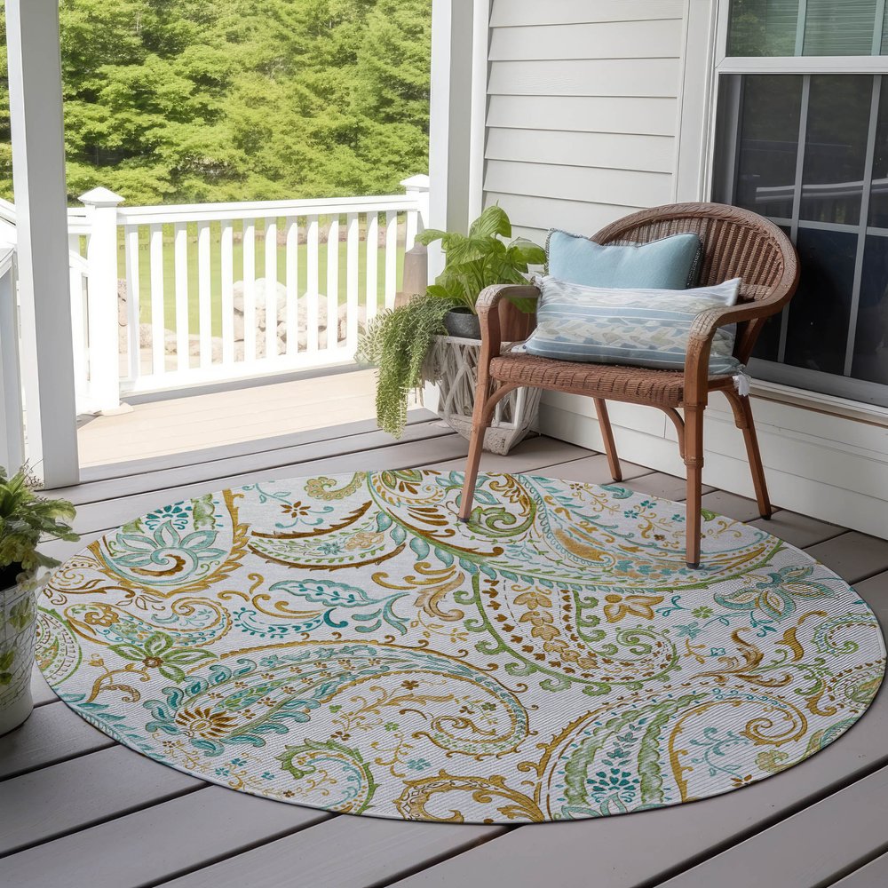 5' X 8' Ivory and Gold Paisley Washable Non Skid Indoor Outdoor Area Rug
