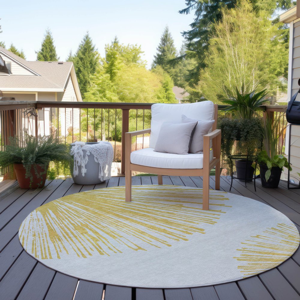 5' X 8' Gold And Ivory Abstract Washable Indoor Outdoor Area Rug