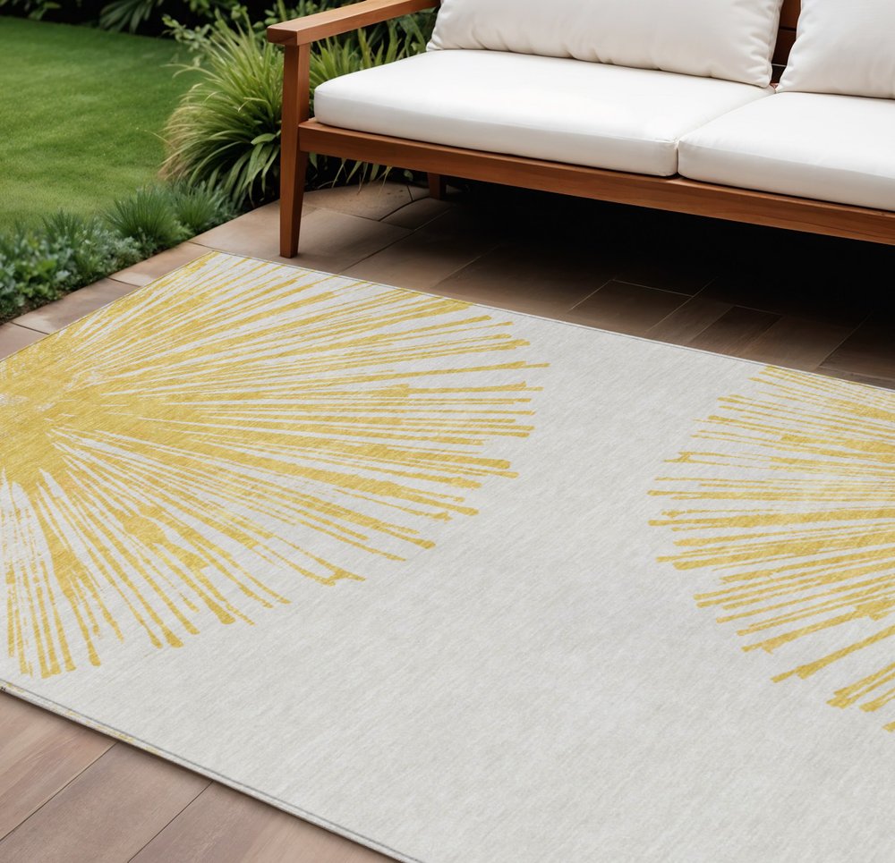 5' X 8' Gold And Ivory Abstract Washable Indoor Outdoor Area Rug