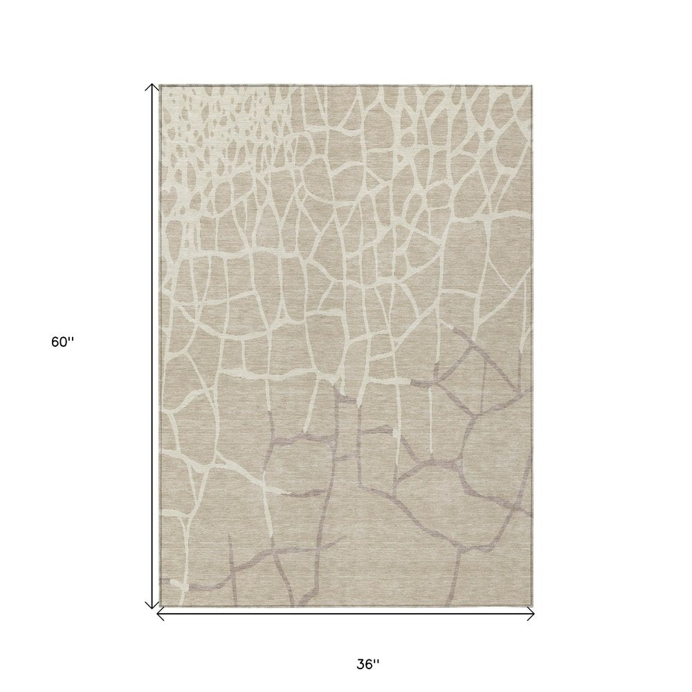 3' X 5' Beige And Tan Abstract Washable Indoor Outdoor Area Rug