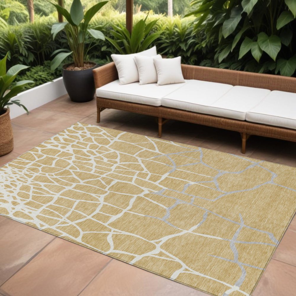 3' X 5' Gold And Beige Abstract Washable Indoor Outdoor Area Rug