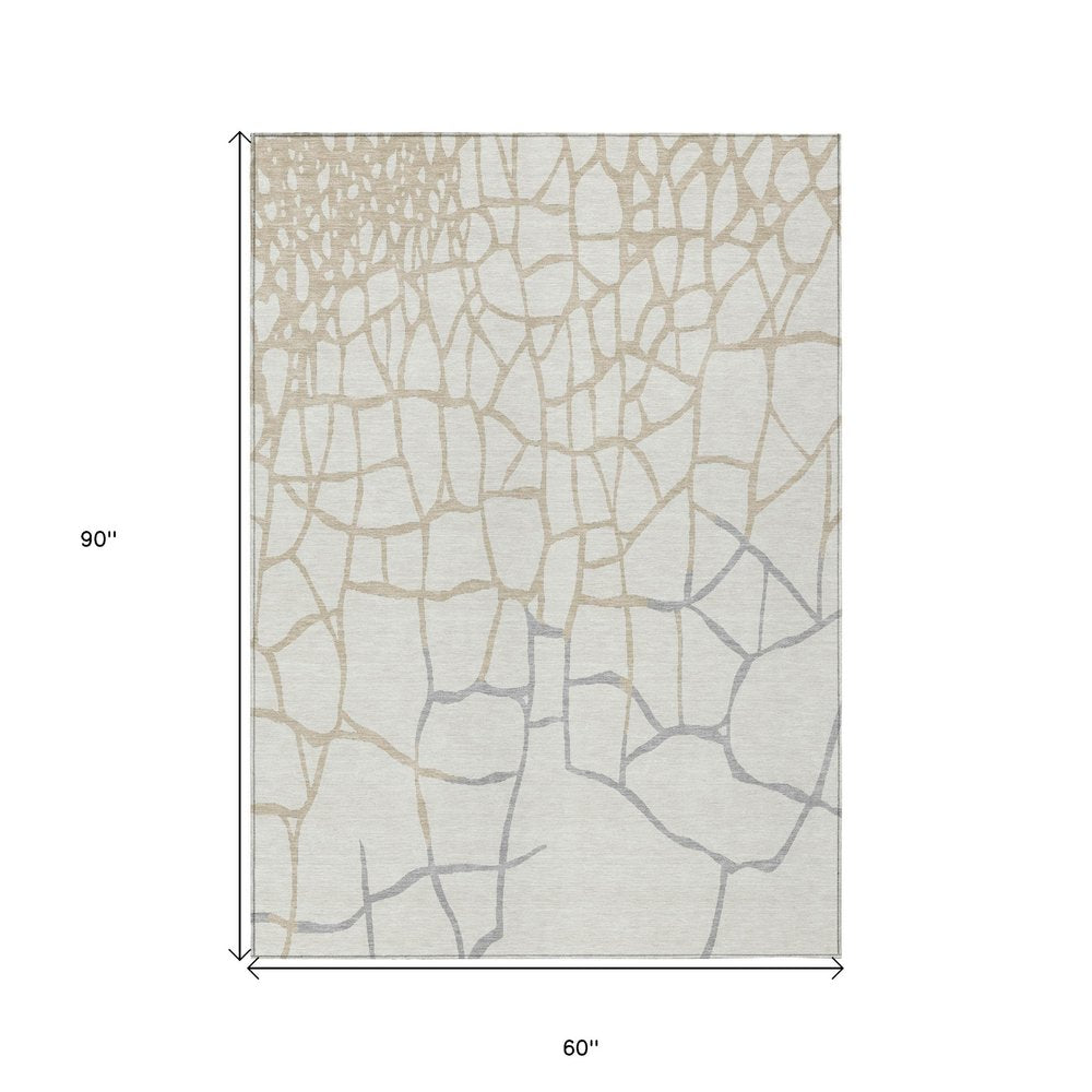 3' X 5' Ivory And Beige Abstract Washable Indoor Outdoor Area Rug