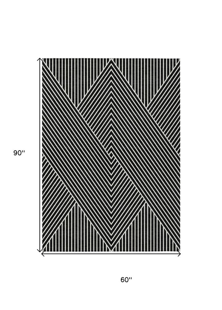 3' X 5' Black And Ivory Geometric Washable Indoor Outdoor Area Rug