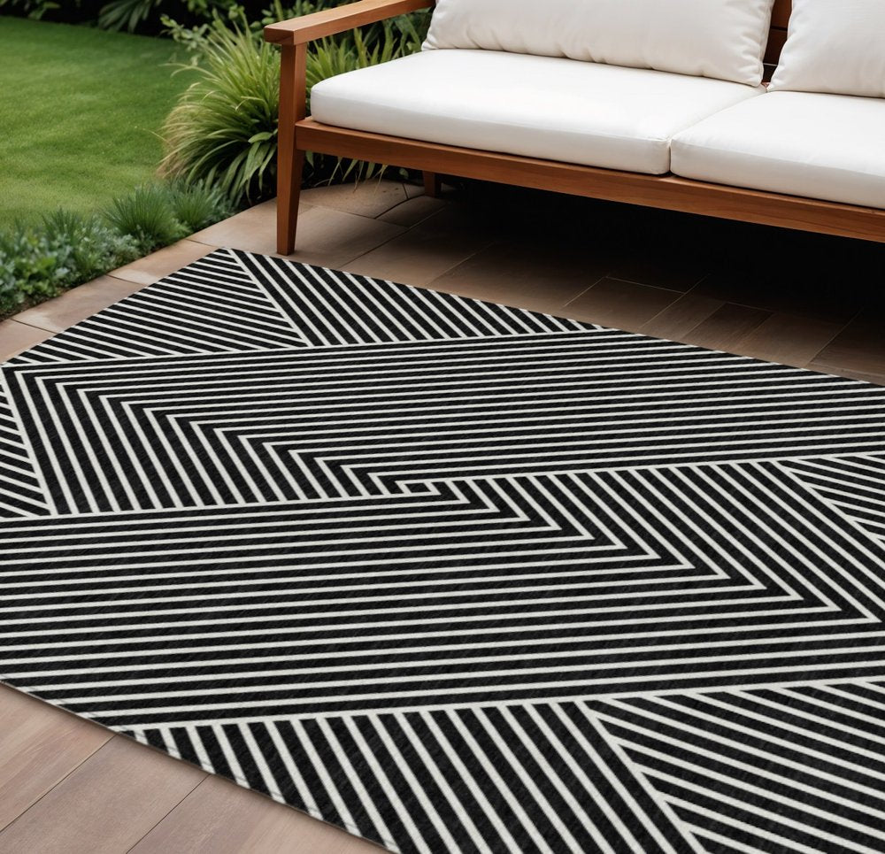 3' X 5' Black And Ivory Geometric Washable Indoor Outdoor Area Rug
