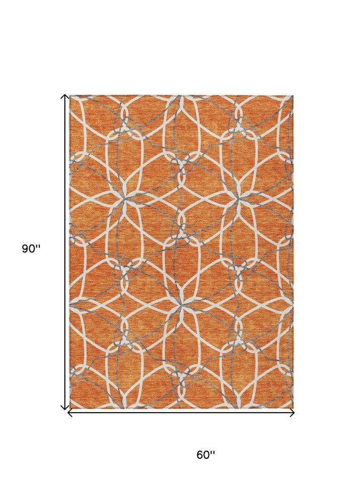 3' X 5' Orange And Ivory Geometric Washable Indoor Outdoor Area Rug