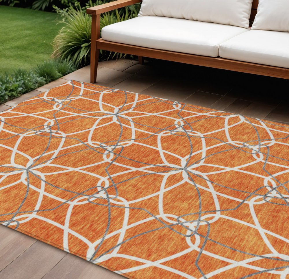 3' X 5' Orange And Ivory Geometric Washable Indoor Outdoor Area Rug