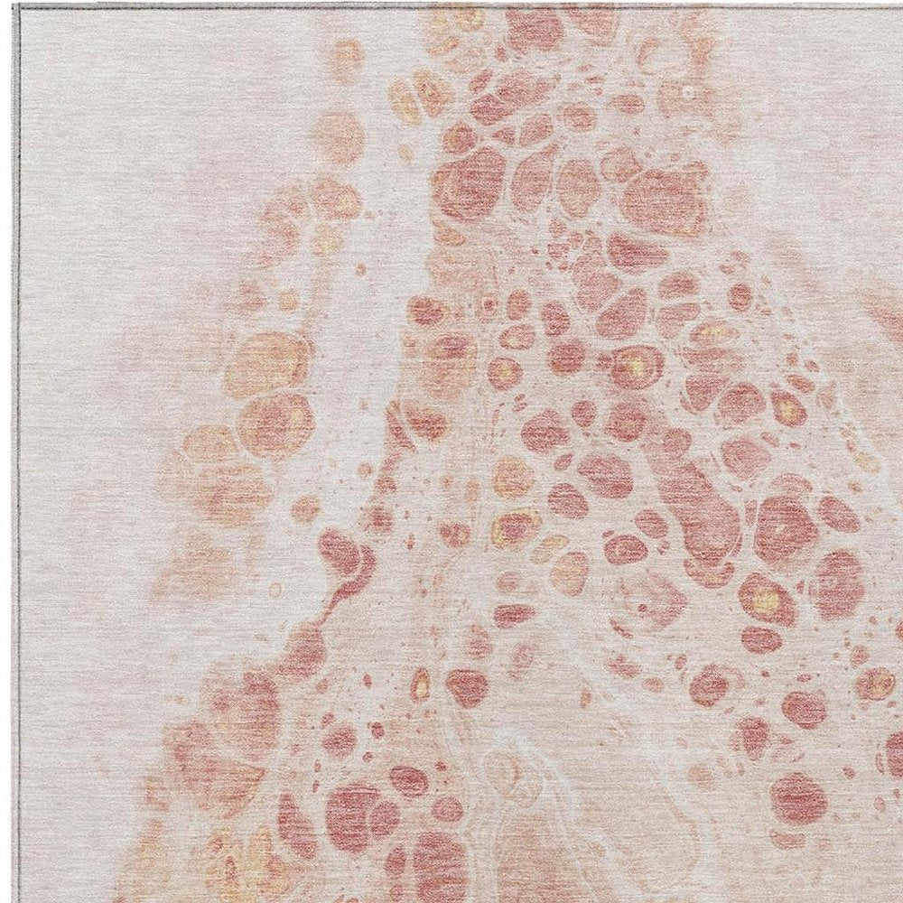 3' X 5' Salmon And Ivory Abstract Washable Indoor Outdoor Area Rug