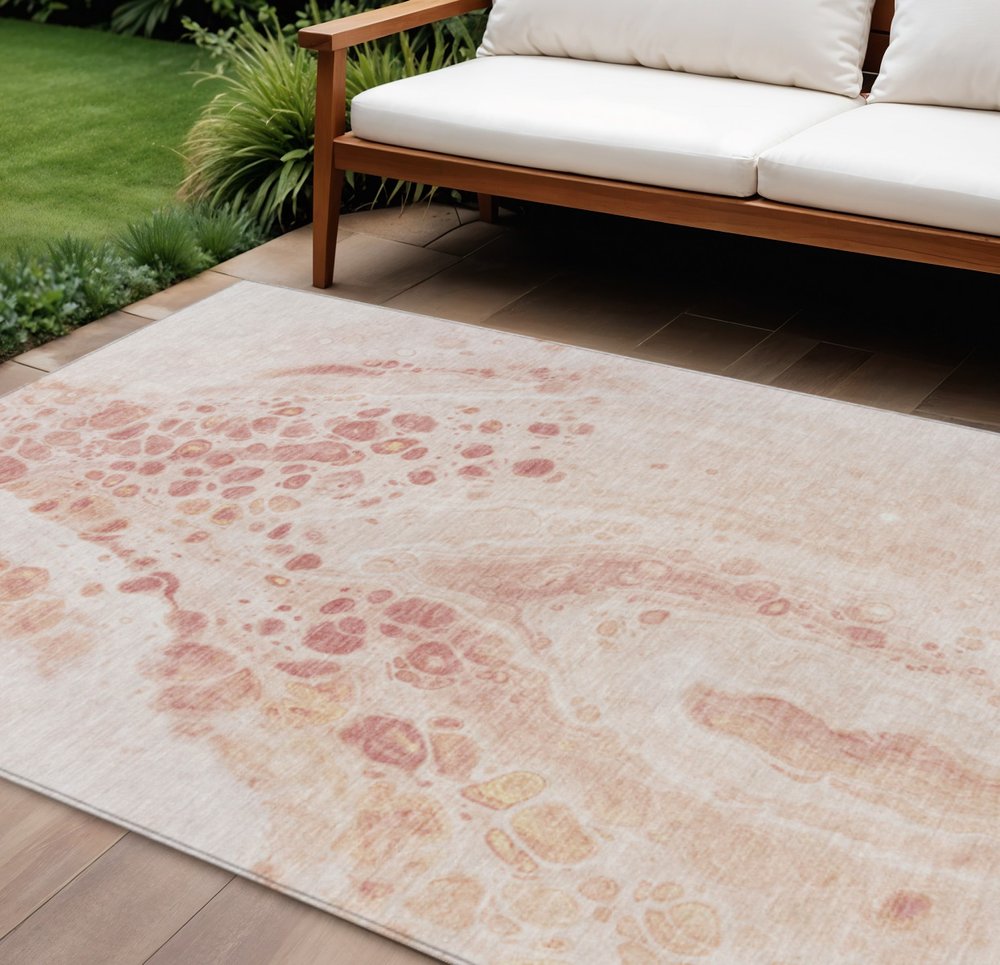 3' X 5' Salmon And Ivory Abstract Washable Indoor Outdoor Area Rug