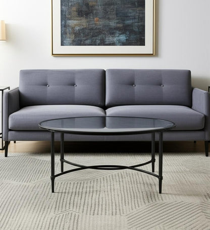 45" Clear and Black Glass and Metal Oval Coffee Table