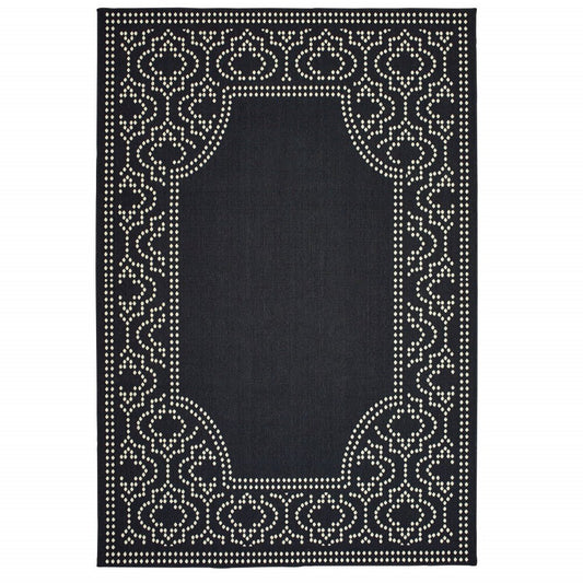2' X 8' Black and Ivory Stain Resistant Indoor Outdoor Area Rug
