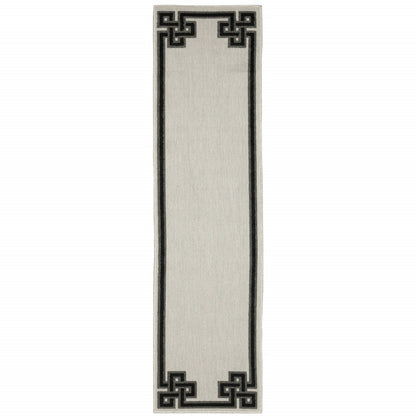 2' X 4' Beige and Black Stain Resistant Indoor Outdoor Area Rug