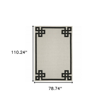 2' X 4' Beige and Black Stain Resistant Indoor Outdoor Area Rug
