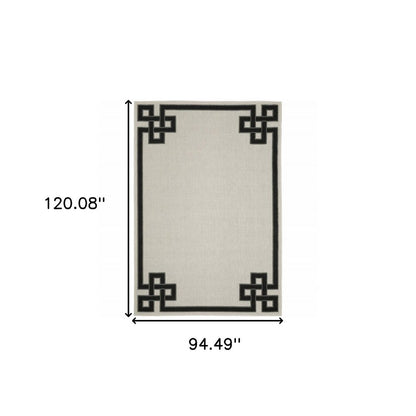 2' X 4' Beige and Black Stain Resistant Indoor Outdoor Area Rug