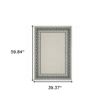 2' X 4' Blue and Beige Stain Resistant Indoor Outdoor Area Rug