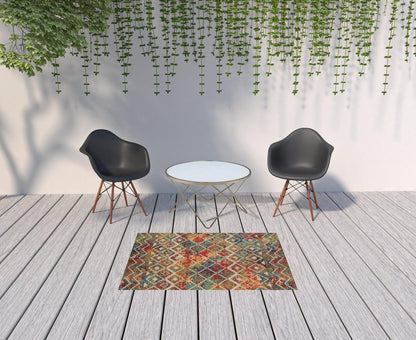 5' X 8' Red And Ivory Geometric Non Skid Indoor Outdoor Area Rug