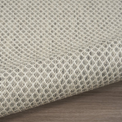 7' X 10' Ivory And Silver Indoor Outdoor Area Rug