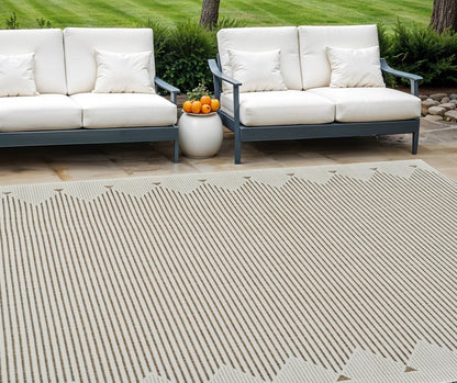 3' X 5' Beige and Brown Geometric Distressed Indoor Outdoor Area Rug
