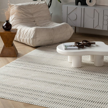 3' X 5' Cream and Beige Striped Distressed Indoor Outdoor Area Rug