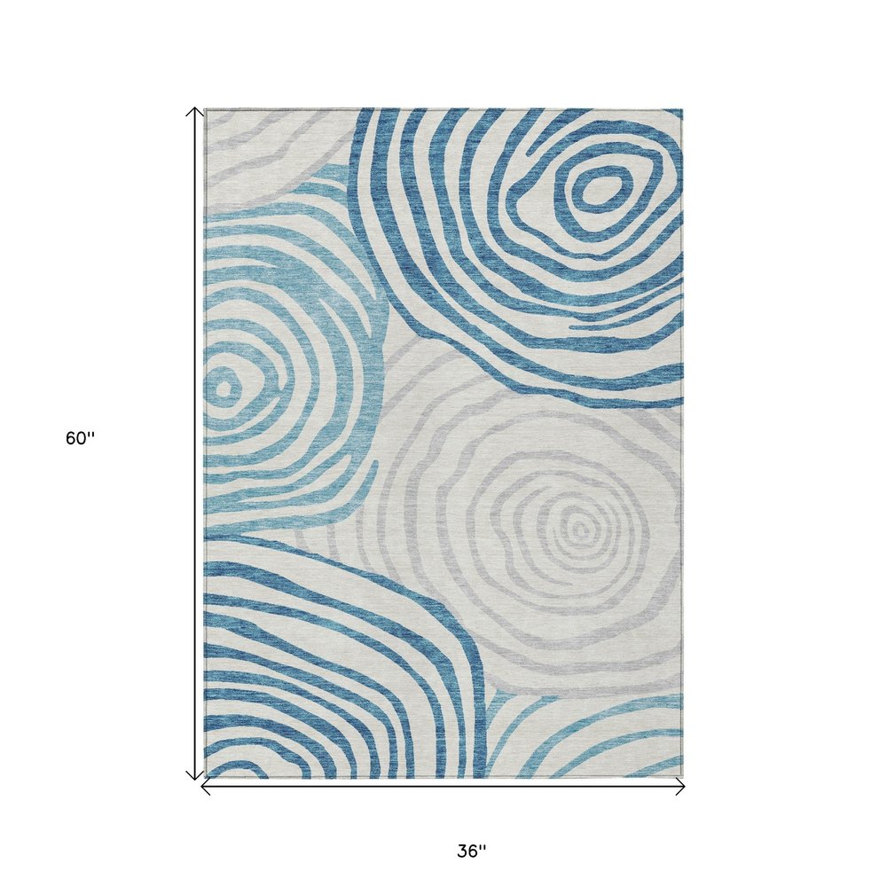 3' X 5' Teal Blue Ivory And Silver Abstract Washable Indoor Outdoor Area Rug