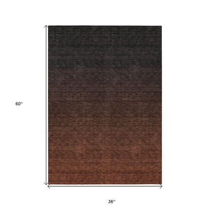 3' X 5' Orange And Charcoal Abstract Washable Indoor Outdoor Area Rug