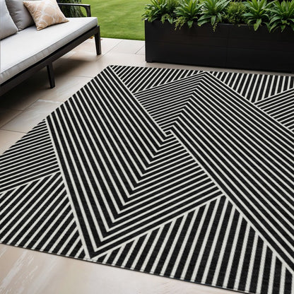 3' X 5' Black And Ivory Geometric Washable Indoor Outdoor Area Rug