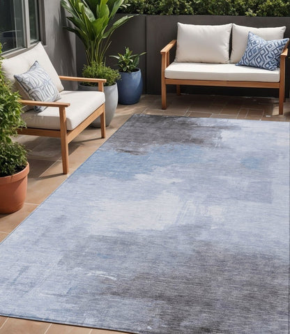 5' X 8' Sky Blue Gray And Ivory Abstract Washable Indoor Outdoor Area Rug