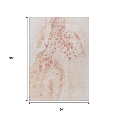 3' X 5' Salmon And Ivory Abstract Washable Indoor Outdoor Area Rug