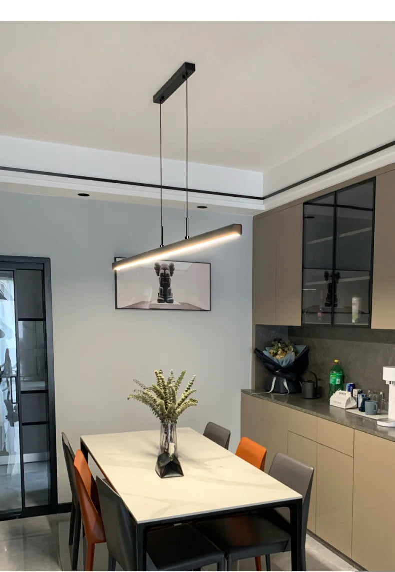 Minimalist modern chandelier—sleek strip light for dining rooms, bars, or office spaces.